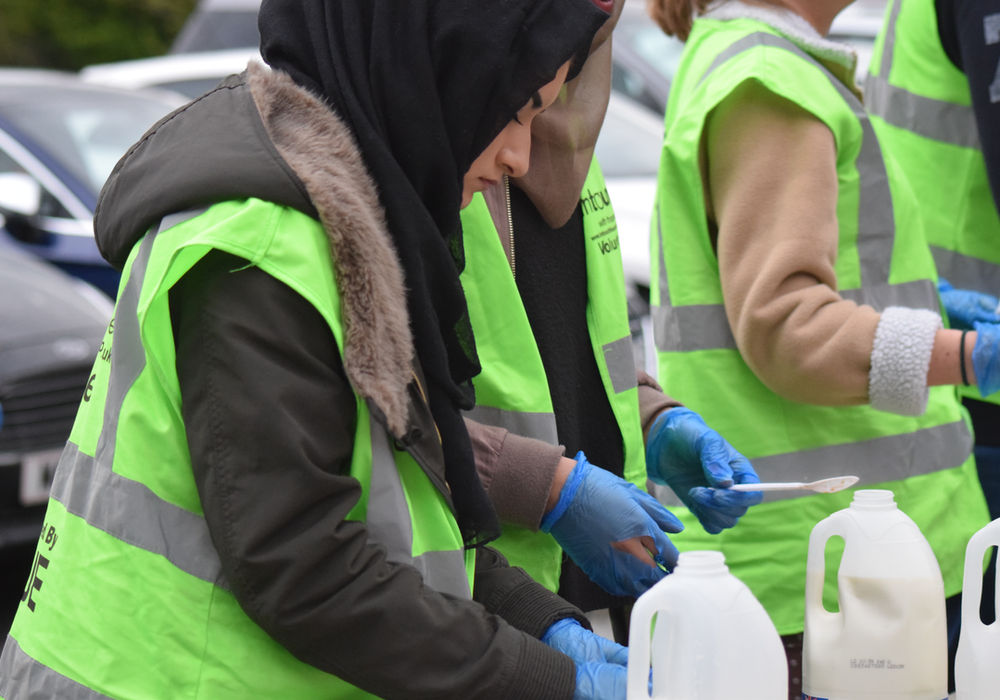 InTouch volunteers preparing to support a food kitchen session